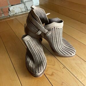 Tan perforated leather booties . Size 5. Never worn